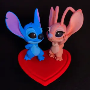 impresión 3d, personaje stitch y angel, lilo y stitch, disney, prototipado 3d, 3d print, diseño 3d, personalización 3d, cultura pop, personajes de tv, hecho a mano, modelado 3d, servicios de impresión 3d